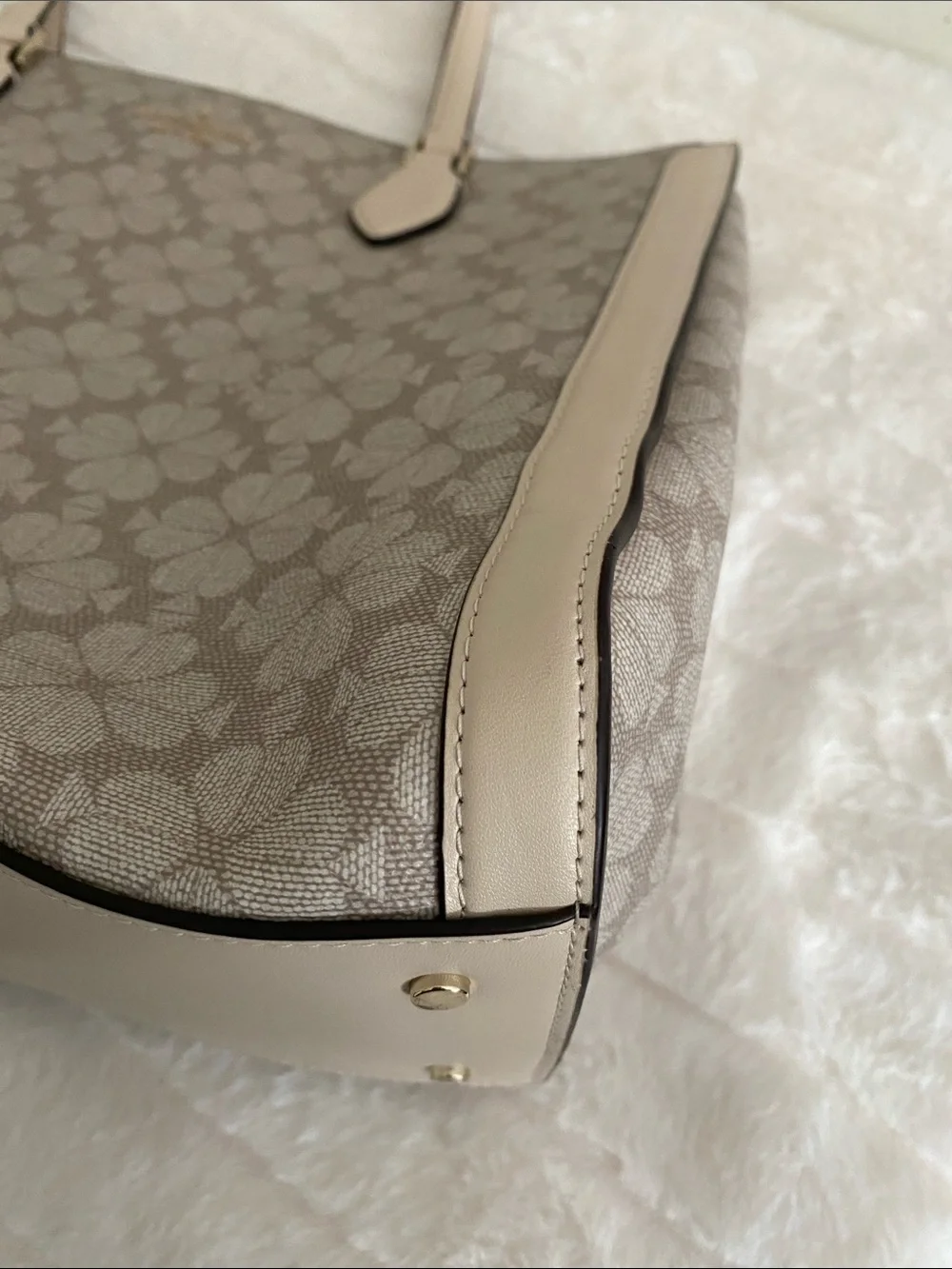 Kate Spade New York Signature Spade Flower East West Laptop Tote in Dark Beige